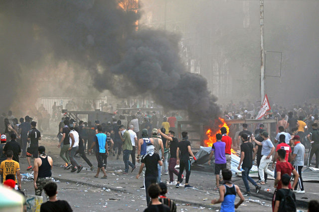 Iraqi protesters demonstrate against state corruption, failing public services, and unemployment in the Iraqi capital Baghdad's central Tayeran Square on Thursday (AFP photo)