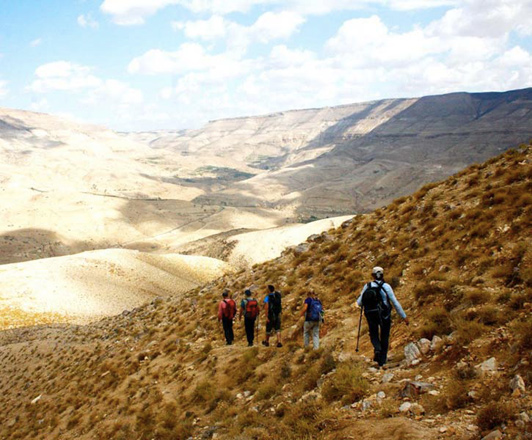 Hikers traverse a section of the Jordan Trail from Wadi Zarqa-Maeen to Wadi Hidan in this undated photo. HRH Prince Raad opened an exhibition recently, which showcases the trail through photography and paintings (Photo courtesy of Jordantrail.org)