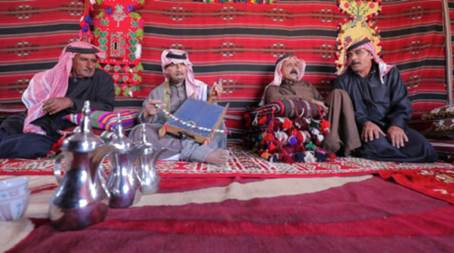 Bedouin men discuss Nabatean poetry (Photo courtesy of UNESCO)