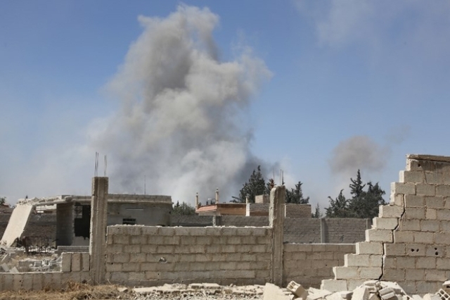 Smoke billows from Douma, last opposition holdout in Syria's Eastern Ghouta, on Saturday (AFP photo)