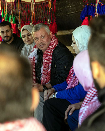   His Majesty King Abdullah on Monday visited Sanam tourist resort in Wadi Rum, affiliated with the Jordanian Heritage Revival Company, a King Abdullah II Fund for Development project, where he met a number of JHRC employees from the local community, as well as a group of youth from around the Kingdom who were taking part in a workshop at the resort (Photo courtesy of Royal Court)