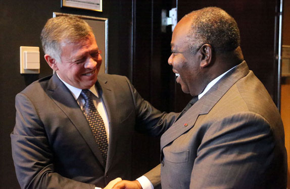 His Majesty King Abdullah is greeted by President of Gabon Ali Bongo Ondimba ahead of their meeting in New York on Saturday (Photo courtesy of Royal Court)