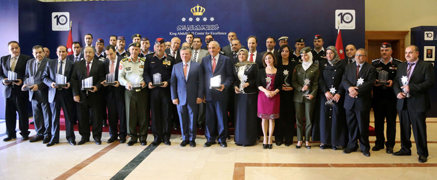 His Majesty King Abdullah poses for a group photo with winners of the King Abdullah II Awards for Excellence on Wednesday (Photo courtesy of Royal Court)