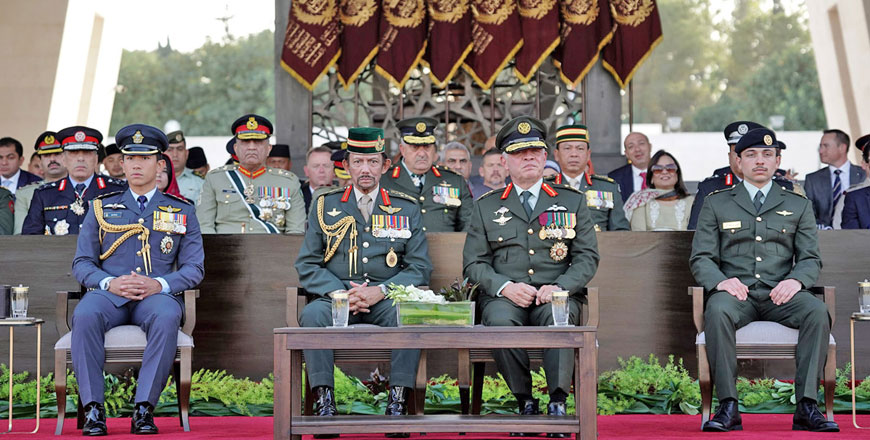 His Majesty King Abdullah, the Supreme Commander of the Jordan Armed Forces-Arab Army, and Sultan Haji Hassanal Bolkiah of Brunei attend the annual Flag Parade at Al Rayah parade ground in the Royal Hashemite Court on Thursday (Photos courtesy of Royal Court)