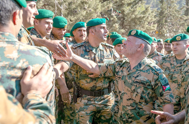 His Majesty King Abdullah, the Supreme Commander of the Jordan Armed Forces-Arab Army, attends a military exercise by the Royal Guard Command at the Royal Guards Training School  (Photo courtesy of Royal Court)