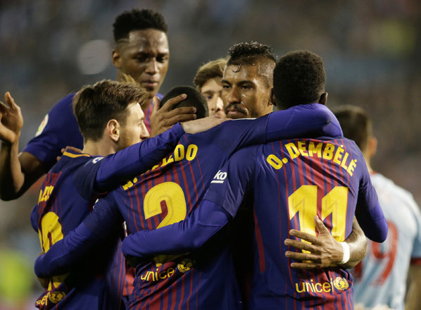 Barcelona’s Paulinho celebrates scoring their second goal with teammates against Celta Vigo on Tuesday in Balaidos, Vigo, Spain  (Reuters photo)