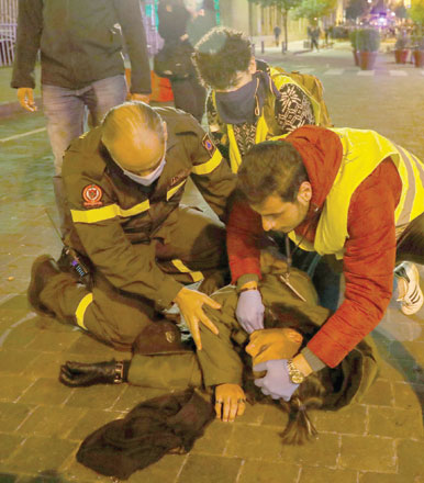 A Lebanese anti-government demonstrator receives first aid following clashes with riot police in Beirut on Saturday (AFP photo)