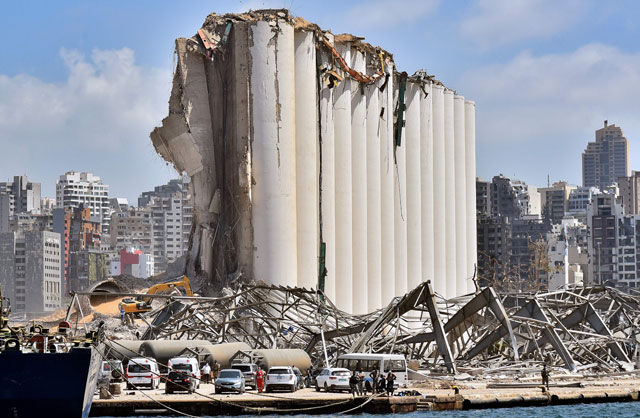 The grain silo in the port of Beirut stands damaged four days after a massive explosion killed more than 150 people and disfigured the capital, on Saturday (AFP photo)