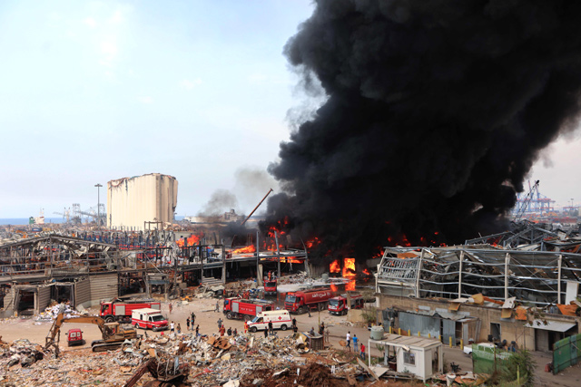 Lebanese firefighters put out a fire that broke out at Beirut's port area, on September 10 (AFP photo)