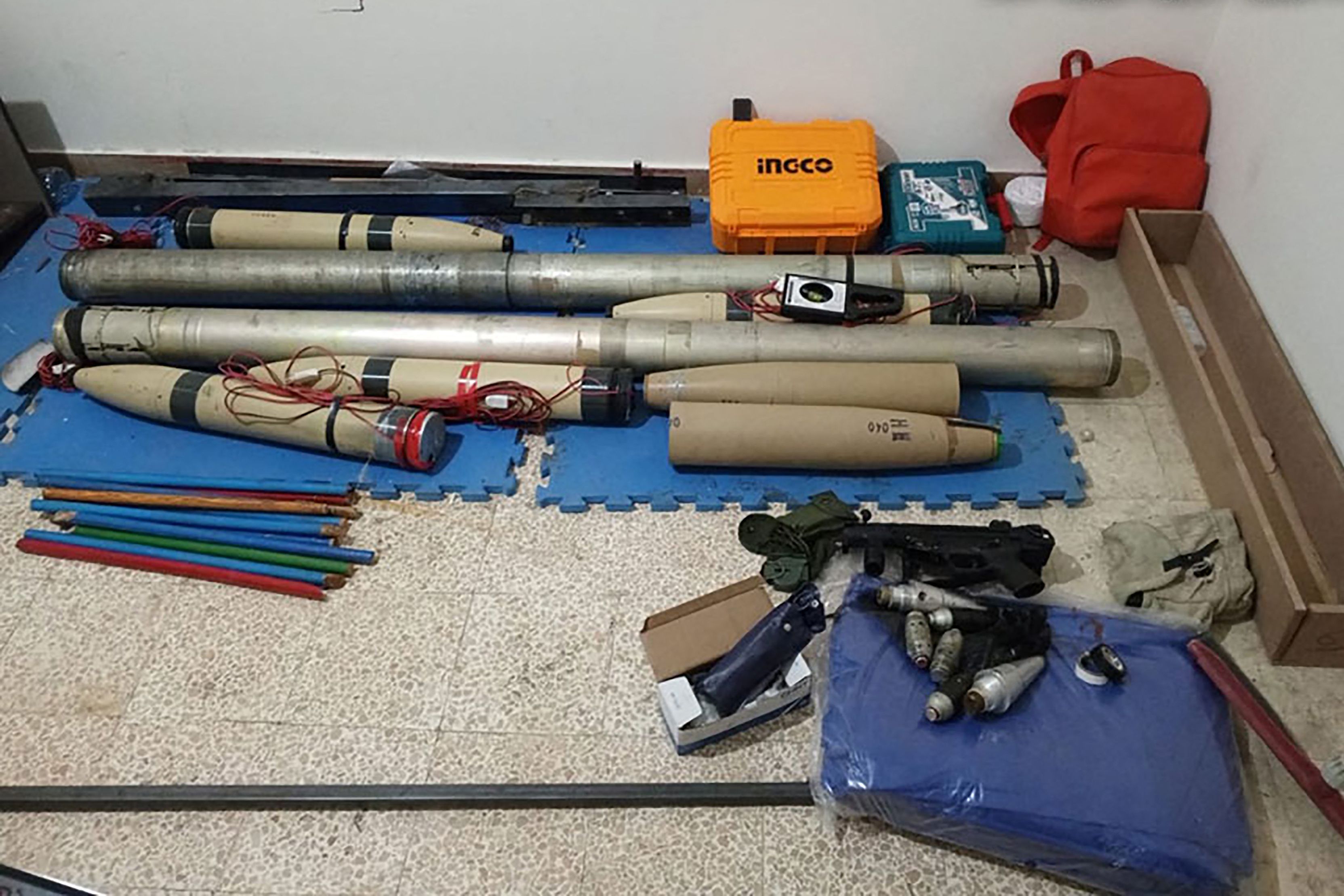 A handout picture provided by the Lebanese armed forces on April 20, 2025, shows weapons that the army said were seized after troops searched a flat in the Sidon-Zahrani area in southern Lebanon (AFP photo)
