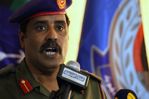 Colonel Ahmed Al Mesmari, a spokesman for forces loyal to General Khalifa Haftar, speaks during a press conference in the eastern Libyan city of Benghazi, on Thursday (AFP photo)