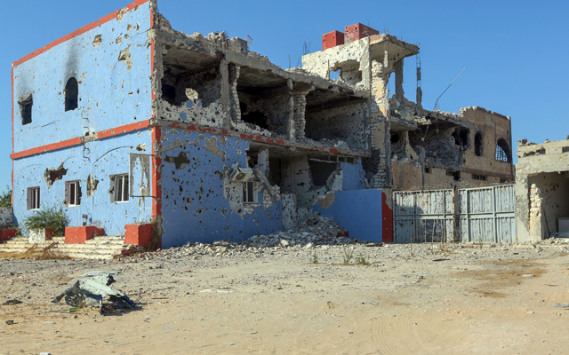 A photo shows a business, damaged during the 14 months of fighting between the UN recognised Government of National Union (GNA) and Marshal Khalifa Haftar, in a southern neighbourhood in the capital Tripoli on July 9 (AFP photo)