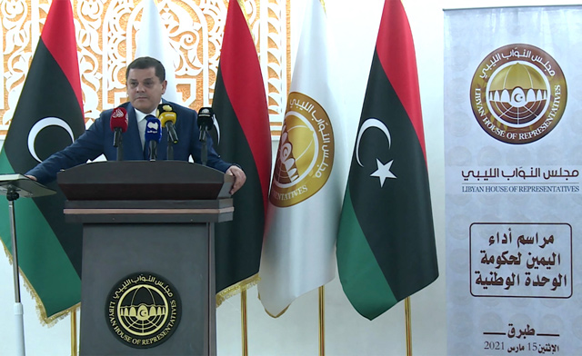 Libya's new interim Prime Minister Abdul Hamid Dbeibah speaks after being sworn in, on Monday, in the eastern coastal city of Tobruk where Libya's new interim Prime Minister Abdul Hamid Dbeibah is to be sworn in to lead the war-torn country's transition to elections in December, after years of chaos and division (AFP photo)