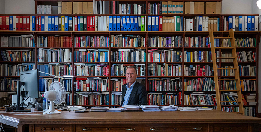 The Director of the Norwegian Nobel Institute and Secretary of the Norwegian Nobel Committee Olav Njolstad poses at his desk in his office in Oslo, Norway, on September 25 (AFP photo)