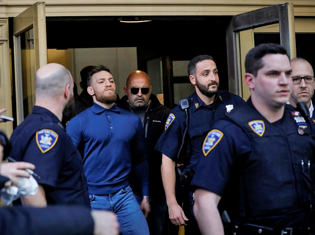 Mixed Martial Arts fighter Conor McGregor exits after appearing in a Brooklyn court on charges of assault stemming from a melee, in the Brooklyn borough of New York City, the US, on Friday(Reuters photo)