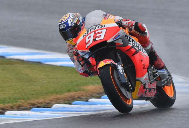Repsol Honda Team rider Marc Marquez of Spain takes a corner during the MotoGP third free practice session of the Japanese Motorcyle Grand Prix in Motegi, Tochigi prefecture, on Saturday  (AFP photo by Toshifumi Kitamura)