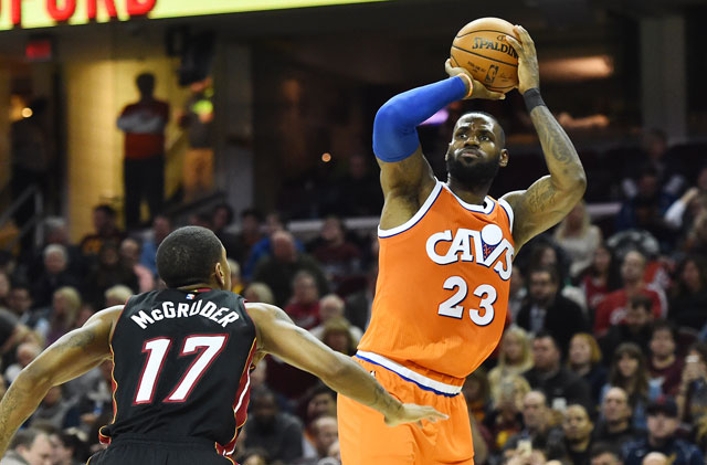 Cleveland Cavaliers forward LeBron James shoots over the defence of Charlotte Hornets centre Frank Kaminsky III during their NBA game in Cleveland on Saturday (Reuters photo by Ken Blaze)