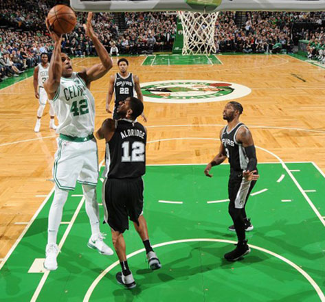 Al Horford of the Boston Celtics shoots the ball against the San Antonio Spurs in Boston, Massachusetts, on Monday (AFP photo by Brian Babineau)