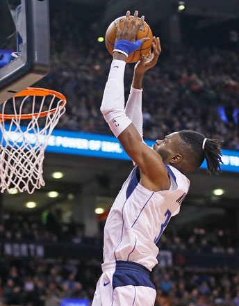 Dallas Mavericks centre Nerlens Noel goes up to make a basket against the Toronto Raptors during their NBA game in Toronto, Canada, on Friday (Reuters photo by John E. Sokolowski)