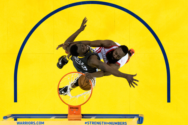 Houston Rockets guard James Harden dunks the basketball against Golden State Warriors forward Draymond Green during Game 4 of the Western Conference finals of the 2018 NBA play-off in Oakland, California, on Tuesday (Reuters photo by Kyle Terada)