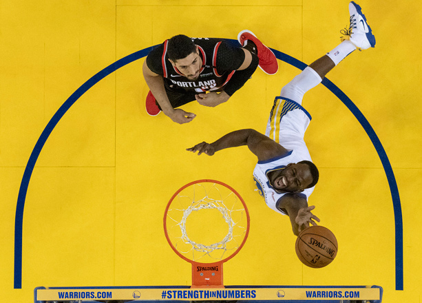 Golden State Warriors forward Draymond Green shoots the basketball against Portland Trail Blazers centre Enes Kanter during their Western conference finals of the 2019 NBA play-offs in Oakland, California, on Tuesday  (Reuters photo by Kyle Terada)