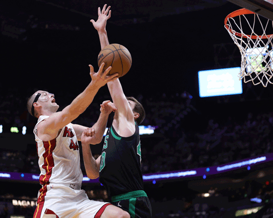 Cody Zeller of the Miami Heat drives to the basket against Luke Kornet of the Boston Celtics in Game 3 of the Eastern Conference Finals in Miami, Florida, on Sunday (AFP photo by Megan Briggs)