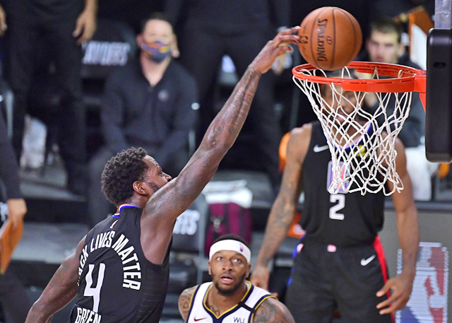 JaMychal Green of the LA Clippers misses a slam against the Denver Nuggets in Game Seven of the Western Conference Second Round during the 2020 NBA Play-offs in Lake Buena Vista, Florida, on Tuesday  (AFP Douglas P. DeFelice)