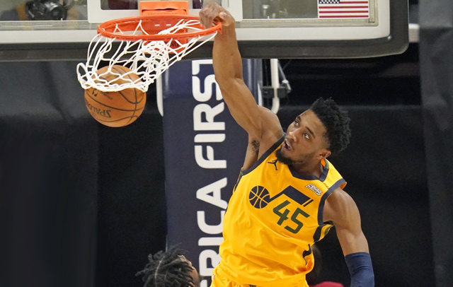 Donovan Mitchell of the Utah Jazz dunks against the Charlotte Hornets during their NBA game in Salt Lake City on Monday  (AFP photo)