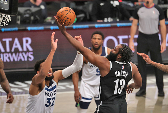 James Harden  of the Brooklyn Nets shoots against Karl-Anthony Towns of the Minnesota Timberwolves during their NBA game in New York City on Monday  (AFP photo by Al Bello)