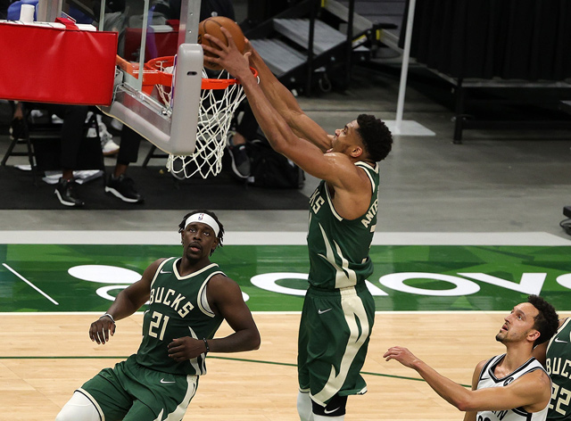 Giannis Antetokounmpo of the Milwaukee Bucks dunks against the Brooklyn Nets during their NBA game in Milwaukee, Wisconsin, on Sunday  (AFP photo by Stacy Revere)