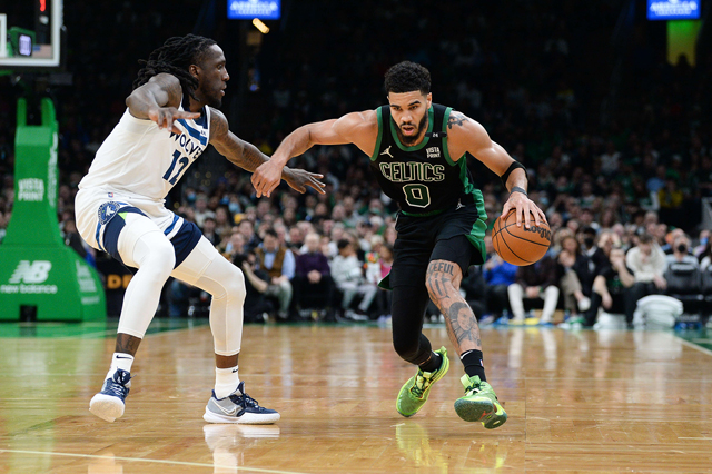 Jayson Tatum of the Boston Celtics dribbles the ball up court against the Minnesota Timberwolves during their NBA in Boston, Massachusetts, on Sunday (AFP photo by Kathryn Riley)