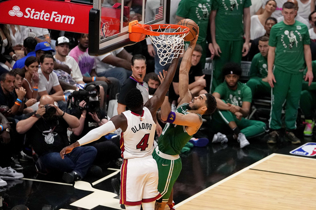 Jayson Tatum of the Boston Celtics shoots the ball against Victor Oladipo of the Miami Heat during Game Seven of the 2022 NBA Play-offs Eastern Conference Finals in Miami, Florida  (AFP photo by Eric Espada)