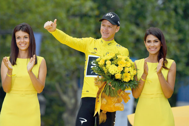 Tour de France 2017’s winner Great Britain’s Christopher Froome celebrates his overall leader yellow jersey on the podium at the end of the 103km twenty-first and last stage of the 104th edition of the Tour de France cycling race on Sunday between Montgeron and Paris Champs-Elysees (AFP photos by Philippe Lopez)