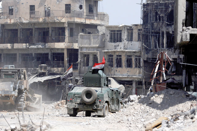 Military vehicle of Iraqi security forces are seen during fighting between Iraqi forces and Daesh militants in the Old City of Mosul, Iraq, on Thursday (Reuters photo)