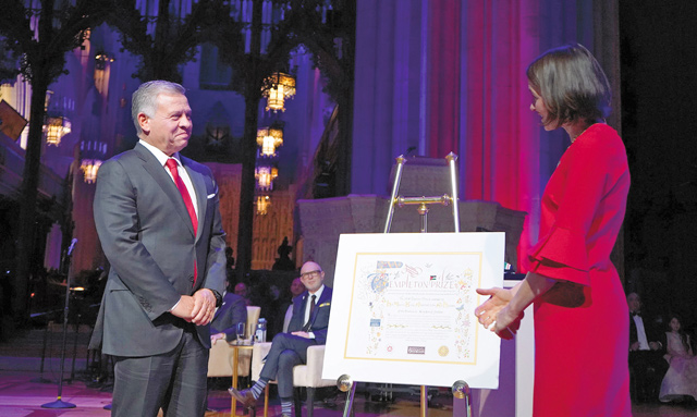 His Majesty King Abdullah receives the 2018 Templeton Prize from President of the John Templeton Foundation Heather Templeton Dill in Washington, DC, on Wednesday (Photo courtesy of Royal Court)
