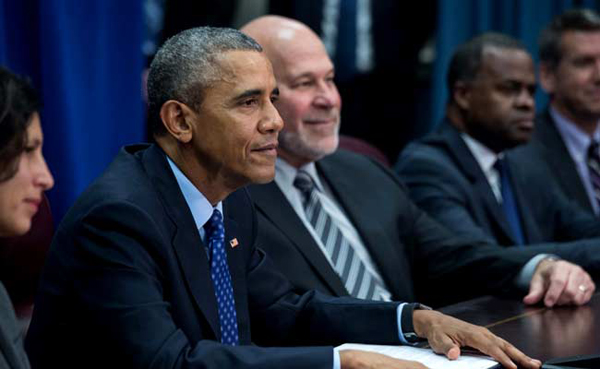 US President Barack Obama looks on after speaking about the Trans-Pacific Partnership agreement at the agriculture department in Washington (AFP file photo)