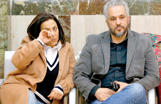 The parents of late Palestinian teenager Nadeem Nuwarah, who was killed by an Israeli occupation forces in 2014 in Beitunia in the occupied West Bank, are seen at the district court in Jerusalem on Wednesday (AFP photo)