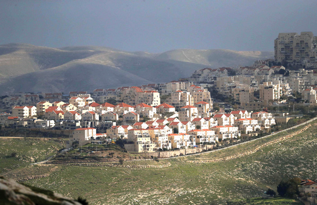 This photo taken from the E1 corridor, a super-sensitive area of the occupied West Bank, shows Israeli settlement of Maale Adumin in the background on Tuesday (AFP photo)