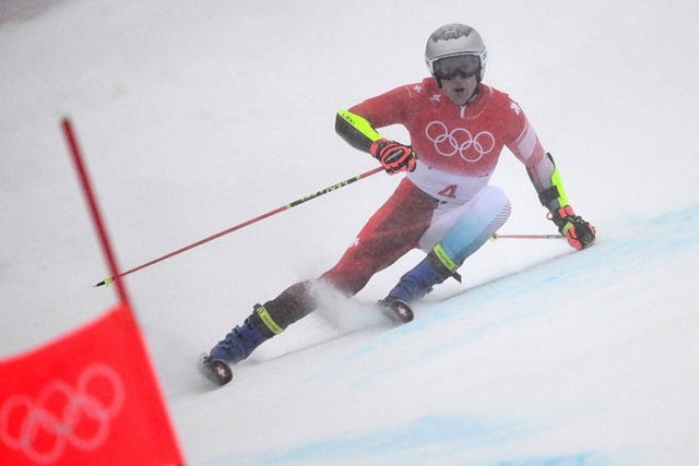 Switzerland’s Marco Odermatt competes in the second run of the men’s giant slalom during the Beijing 2022 Winter Olympic Games in Yanqing on Sunday  (AFP photo by Fabrice Coffrini)