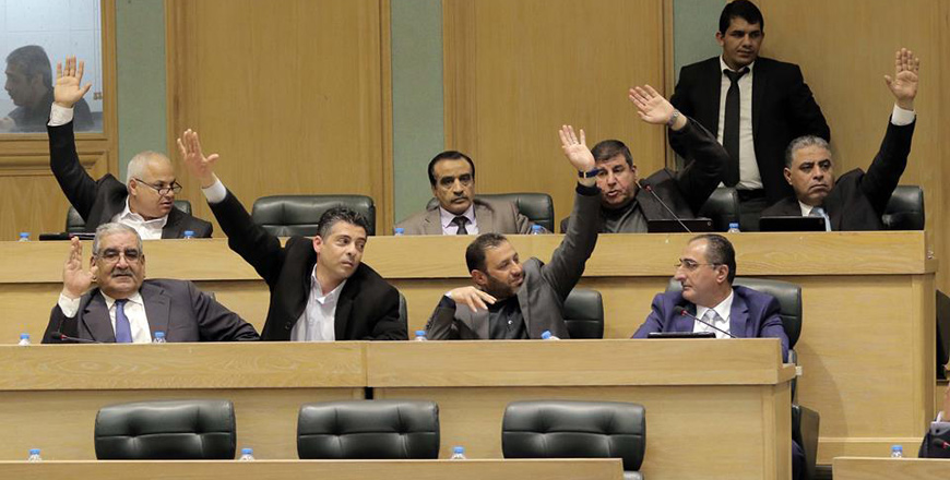 Deputies take a vote during a Parliament session on Tuesday (Photo by Osama Aqarbeh)