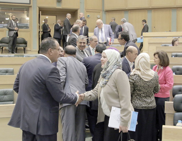 Lawmakers gather for the first meeting in the parliamentary extraordinary session, dedicated to judicial-reform oriented laws, on Tuesday (Photo by Osama Aqarbeh)