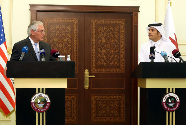 US Secretary of State Rex Tillerson and Qatari Foreign Minister Sheikh Mohammed Bin Abdulrahman Al Thani speak during a press conference in Doha on Tuesday (AFP photo)