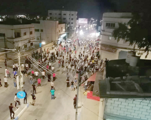 This photo circulated on social media purportedly shows protesters in Ramtha during small-scale riots that broke out on Friday that saw young people closing the main street in their northern district in protest against the government's decision to intensify measures on the Jaber border crossing with Syria (Social media photo)