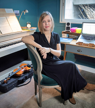 French music composer Camille Pepin poses in her studio, in Paris, on February 11 (AFP photo)