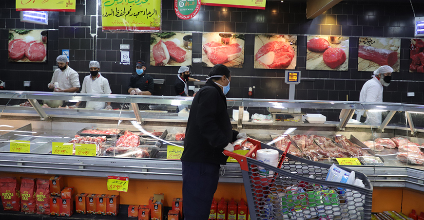 A customer shops in the deli of a supermarket in Amman on Monday (Petra photo)