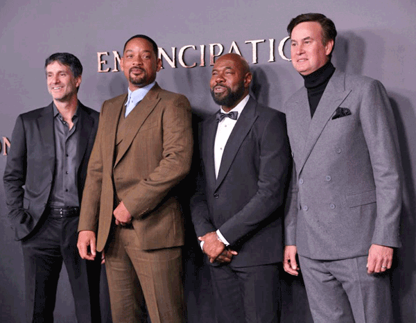 Left to right: Apple co-head of programming Jamie Erlicht, US actor Will Smith, US director Antoine Fuqua and Apple co-head of programming Zack Van Amburg pose upon arrival for the European premiere of  ‘Emancipation’ at the Vue West End in London on Friday (AFP photo by Isabel Infantes)