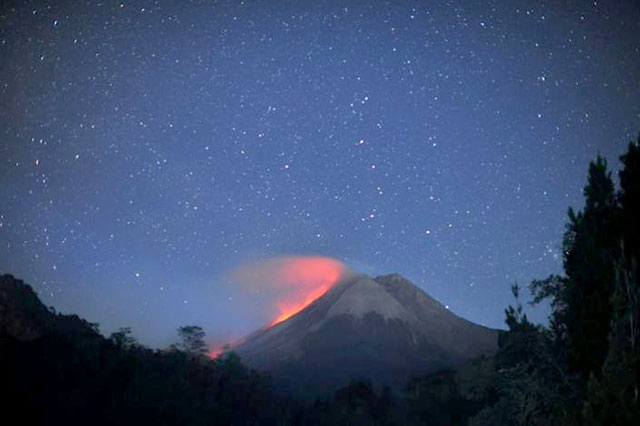 Eruptions from volcanoes such as Indonesia's Mount Merap won't counteract the effect of greenhouse gases (AFP photo)