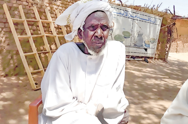 Hassan Issac, an internally displaced person who escaped from fighting and currently resides in Camp Kalma, speaks during an interview at the camp about 15 kilometres east of Nyala the capital of South Darfur state in western Sudan, on Sunday (AFP photo)