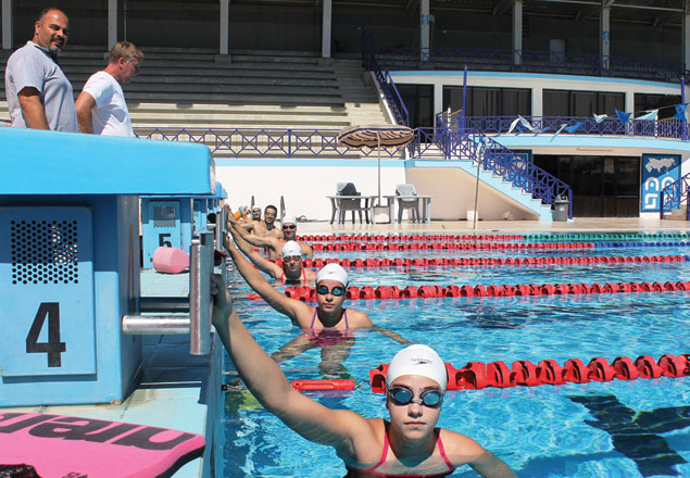 Swimmers train at the Jordan Swimming Federation’s Olympic-sized pool under the watchful eyes of their coaches (Photo courtesy of JOC News Service)