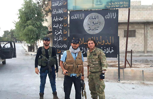 Members of Free Syrian Army (FSA) pose as they patrol in Jarabulus district of Aleppo, Syria, after taking control of the district’s centre from Daesh terrorists during the ‘Operation Euphrates Shield’ led by Turkish army and backed by Syrian National Coalition forces including FSA, on Wednesday (Photo by Anadolu Agency)